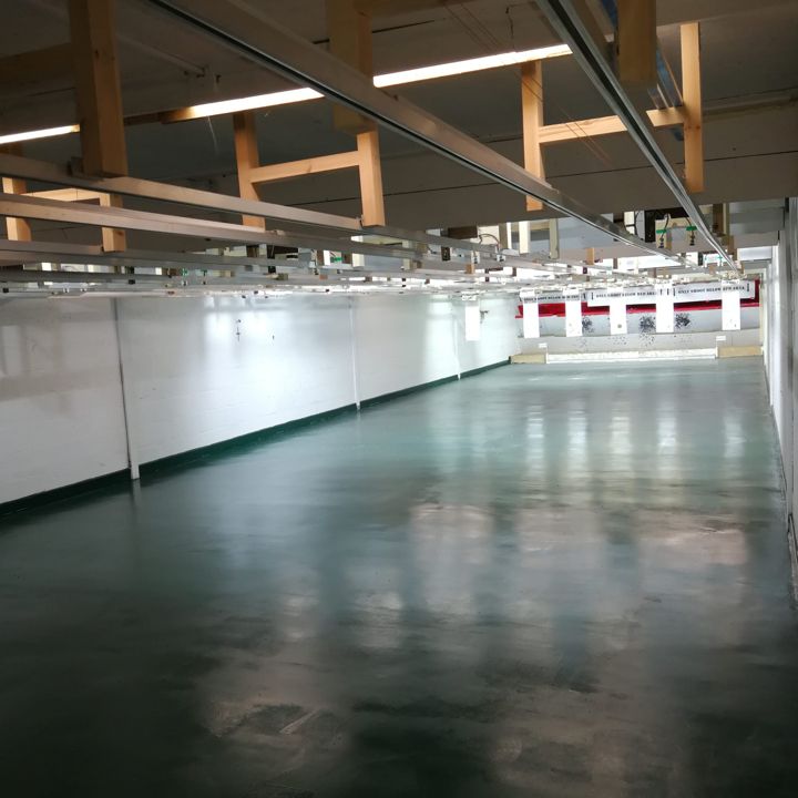A view along the range showing the new floor and the ceiling lights